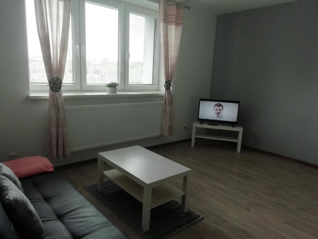 Televiisor ja/või meelelahutuskeskus majutusasutuses Apartmány Stdaniela