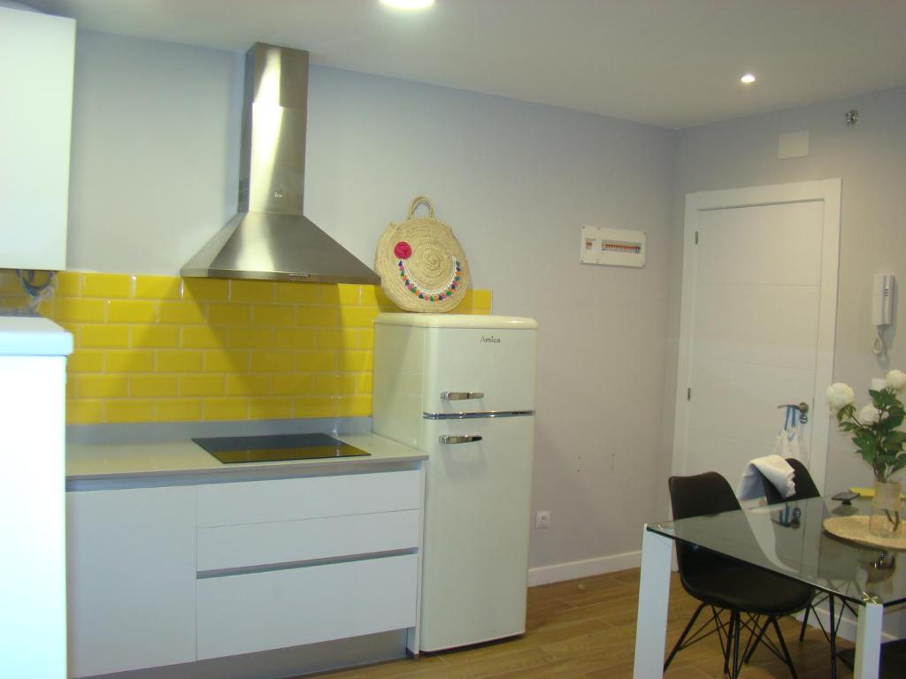 Η κουζίνα ή μικρή κουζίνα στο Apartamentos LA PEREDA SANTANDER