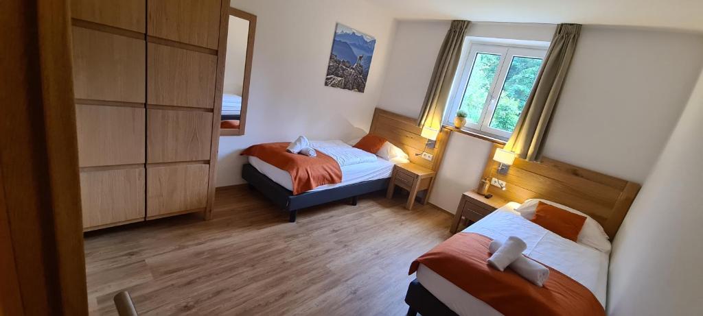 Postel nebo postele na pokoji v ubytování AmThumersbach