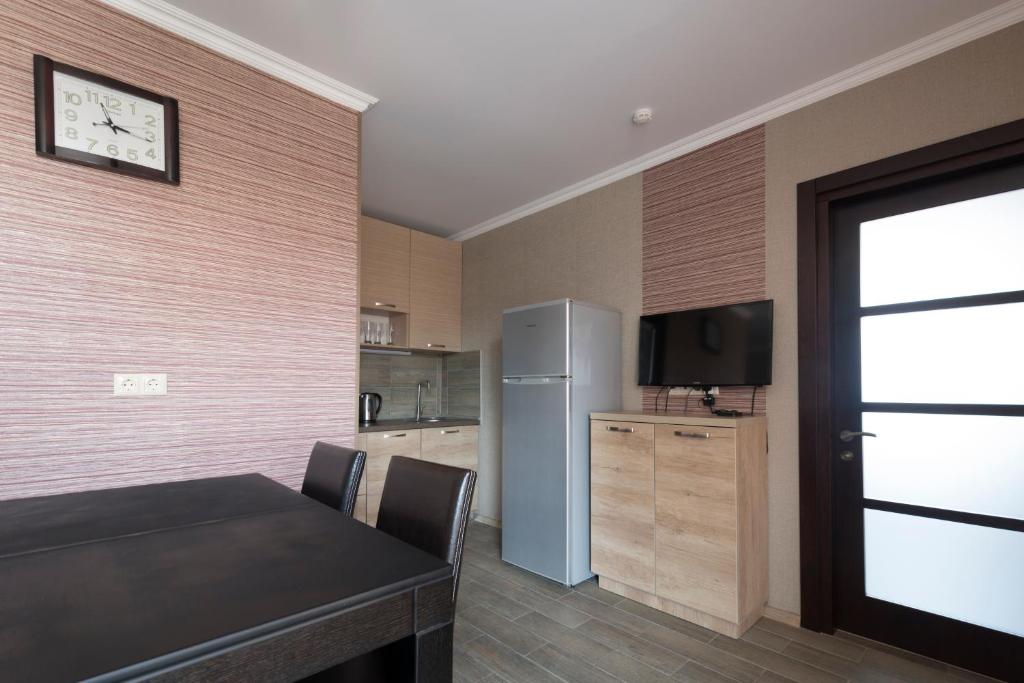 Kuchyň nebo kuchyňský kout v ubytování Orbi Residence Hotel Official