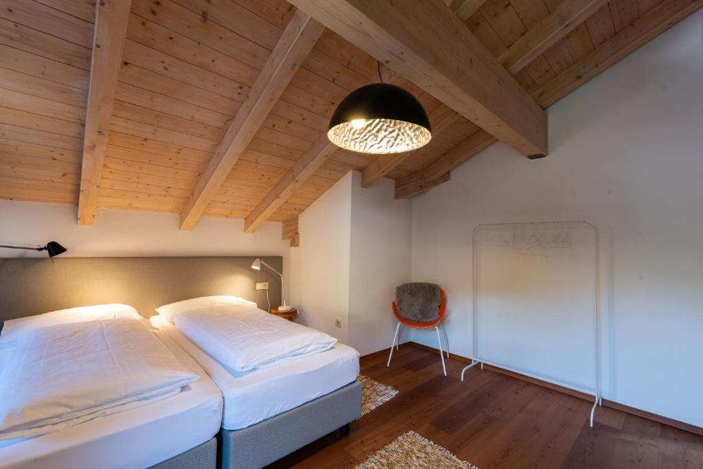 Postel nebo postele na pokoji v ubytování Apartment Stifter