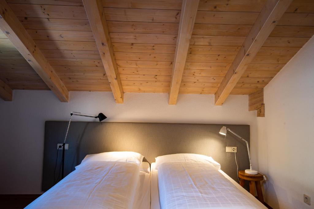 Postel nebo postele na pokoji v ubytování Apartment Stifter