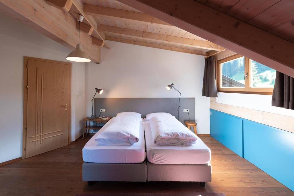 Postel nebo postele na pokoji v ubytování Apartment Stifter
