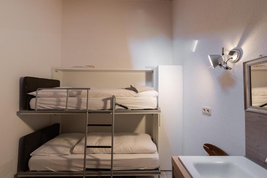 Postel nebo postele na pokoji v ubytování Apartment Stifter