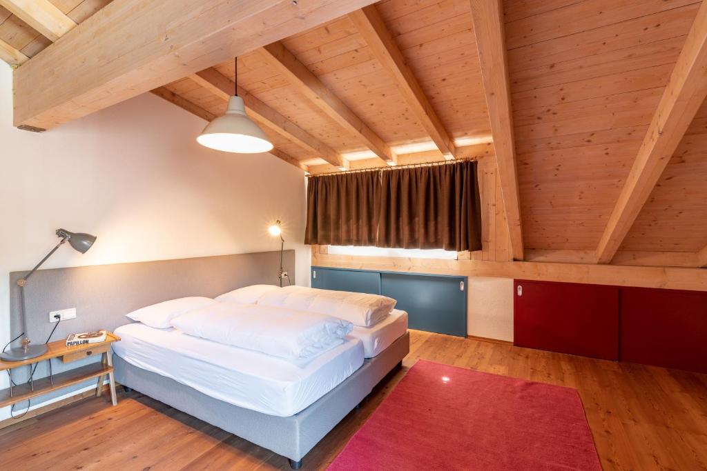 Postel nebo postele na pokoji v ubytování Apartment Stifter