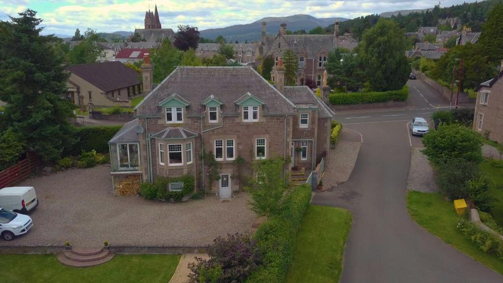 an aerial view of a large house in a city at Firtree Bed and Breakfast at Galvelbeg House in Crieff