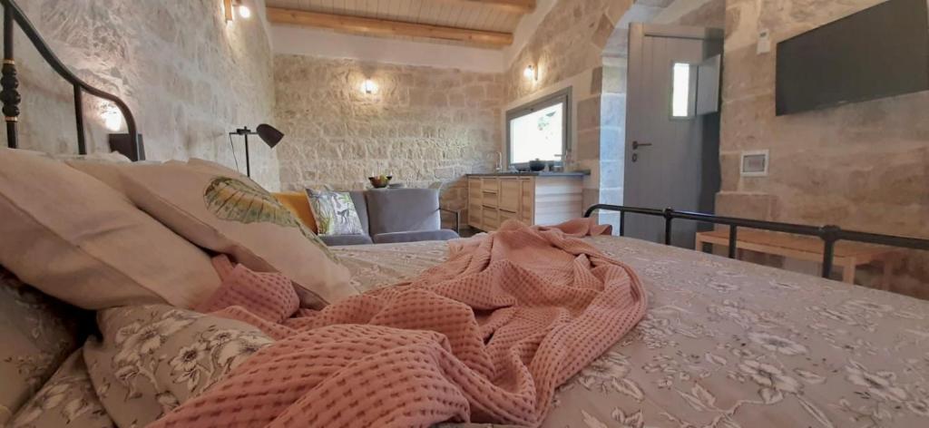 Televízia a/alebo spoločenská miestnosť v ubytovaní Locanda Angelica