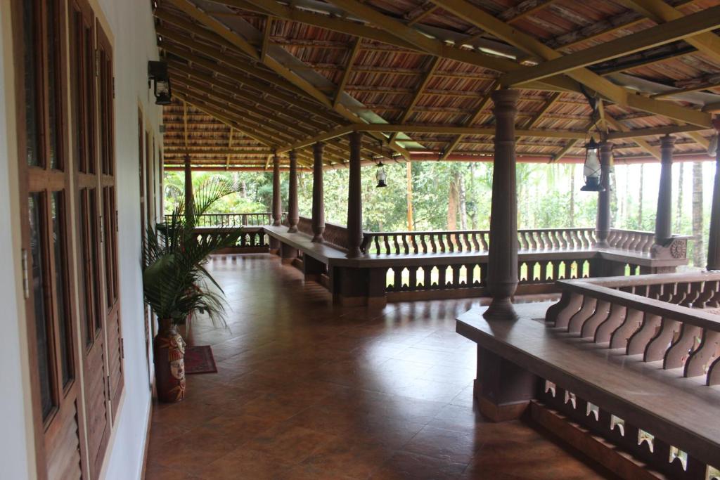 Balkón nebo terasa v ubytování Wayal Wayanad Farm Resort