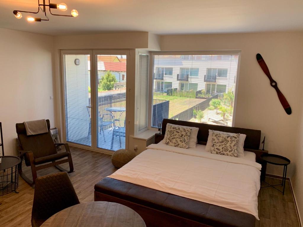 Postel nebo postele na pokoji v ubytování Apartmán C16 Mikulov