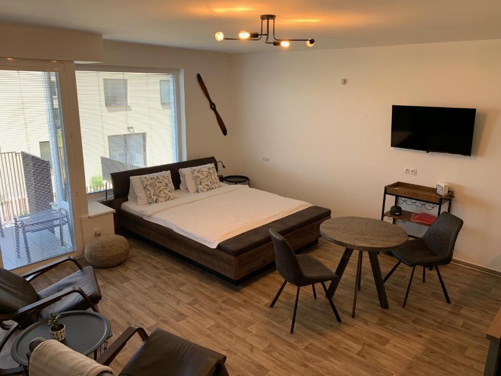 Postel nebo postele na pokoji v ubytování Apartmán C16 Mikulov
