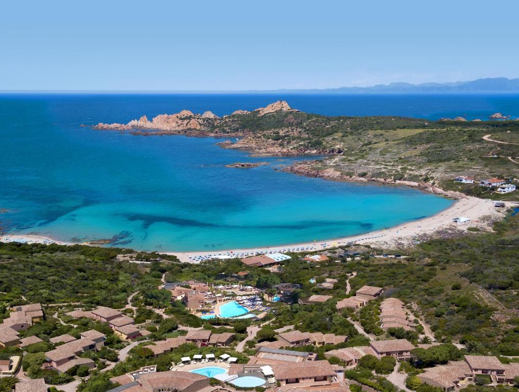 an aerial view of a beach and the ocean at Hotel Marinedda Thalasso & Spa in Isola Rossa