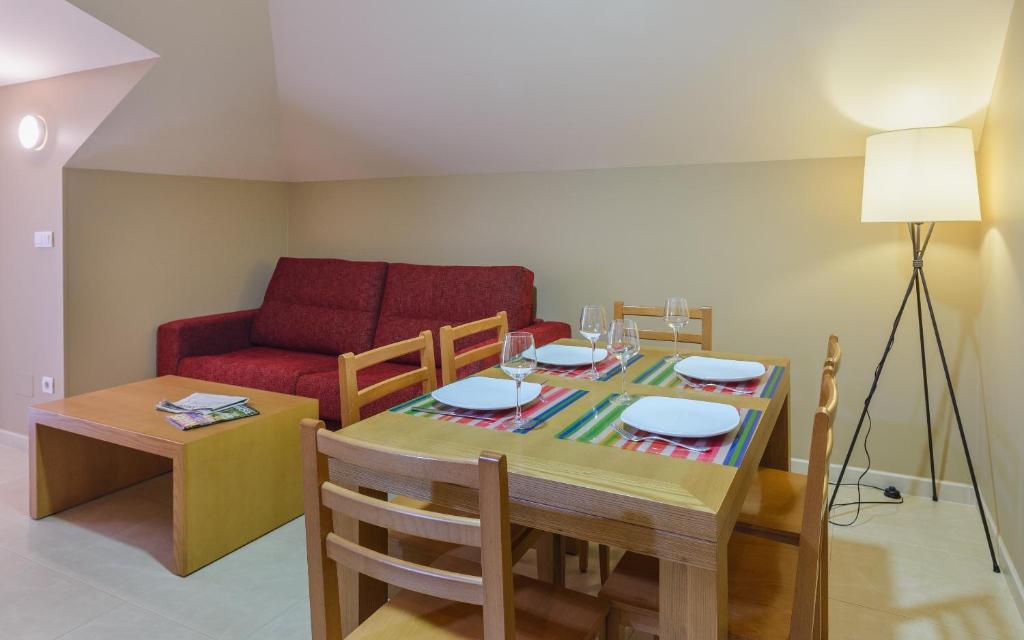 A seating area at Apartamentos Trisquel
