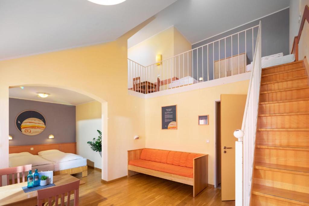 Postel nebo postele na pokoji v ubytování JUFA Hotel Nördlingen