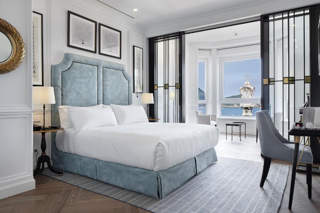 Posteľ alebo postele v izbe v ubytovaní Hotel Boutique Villa Favorita