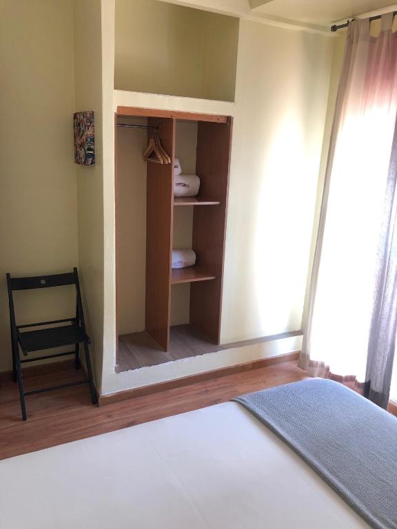 Cama o camas de una habitación en Hospedería Luis de Góngora