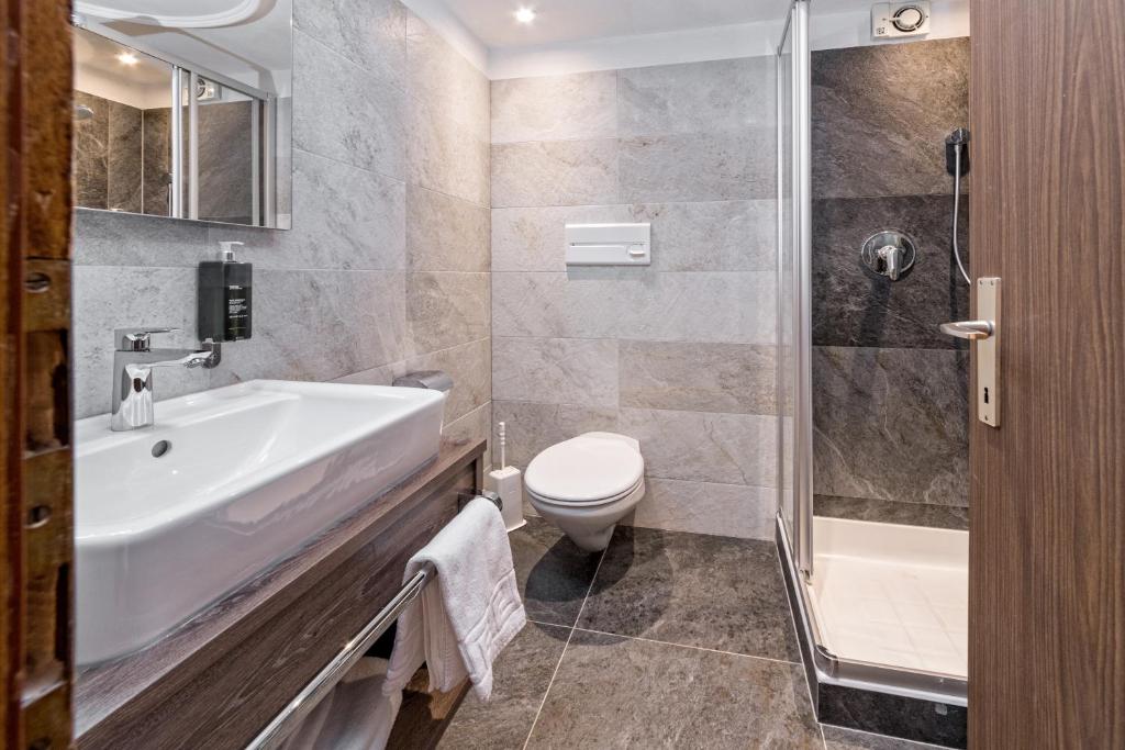 Koupelna v ubytování Hotel Brunella