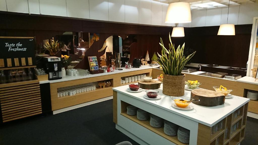 Příslušenství pro přípravu čaje a kávy v ubytování Hotel Adamantino