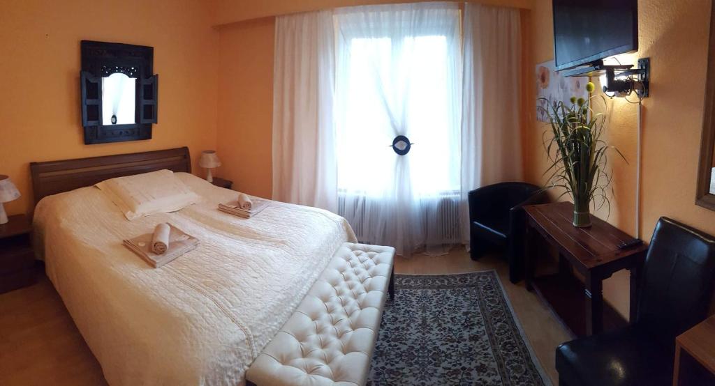 Postel nebo postele na pokoji v ubytování Hotel König Stefan