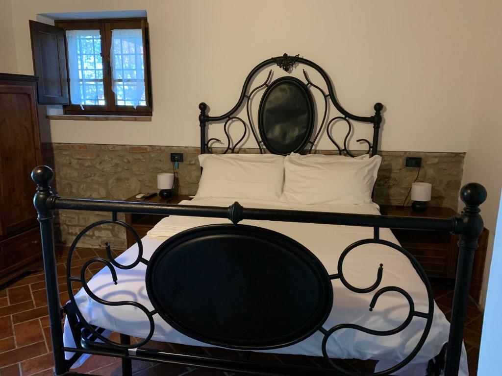 Posteľ alebo postele v izbe v ubytovaní B&B La Loccaia