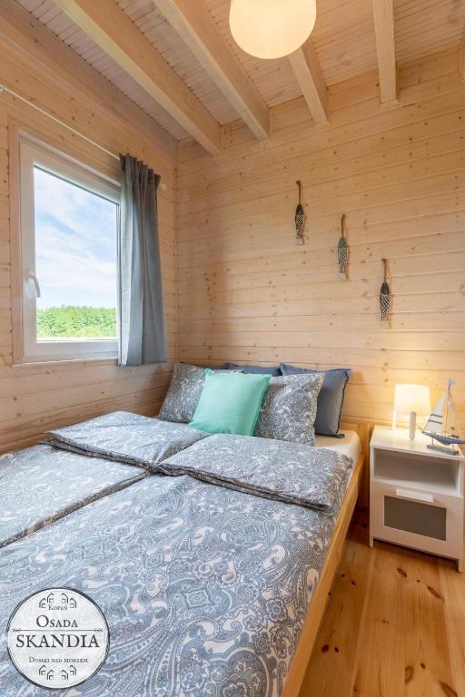 Postel nebo postele na pokoji v ubytování Osada Skandia Kopań