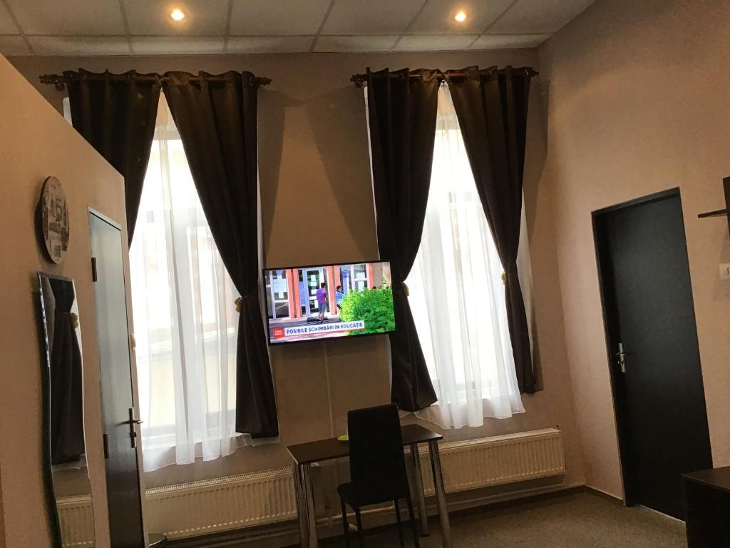 TV a/nebo společenská místnost v ubytování Casa IDA 1896