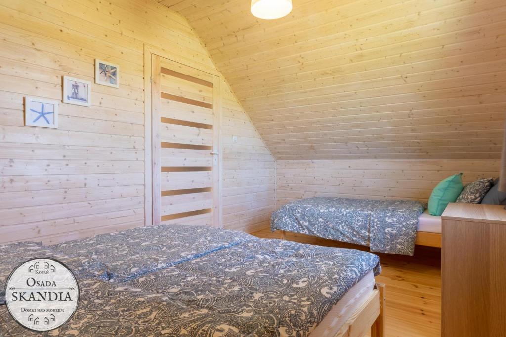 Postel nebo postele na pokoji v ubytování Osada Skandia Kopań