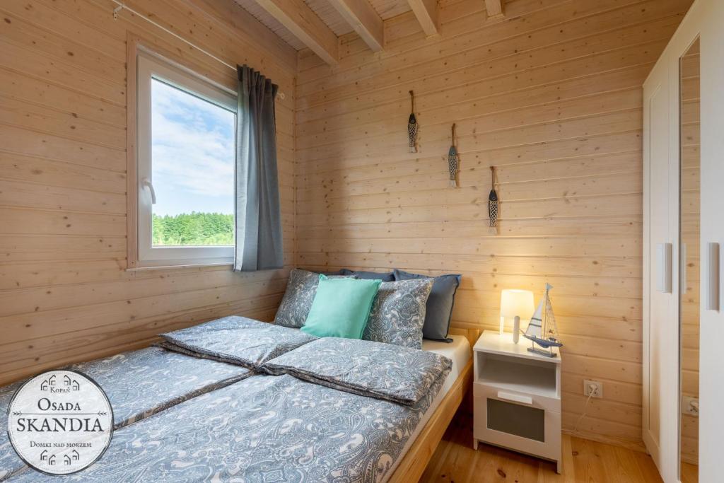 Postel nebo postele na pokoji v ubytování Osada Skandia Kopań