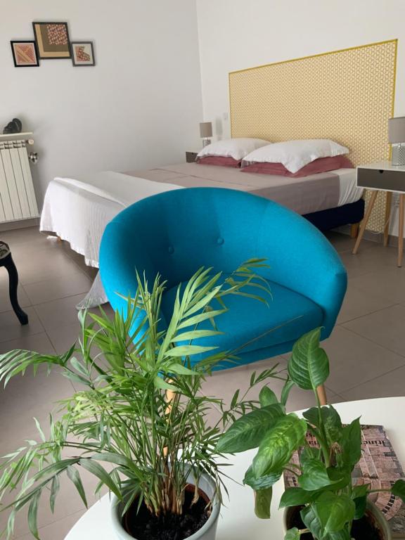 Ένα ή περισσότερα κρεβάτια σε δωμάτιο στο Casa Mia