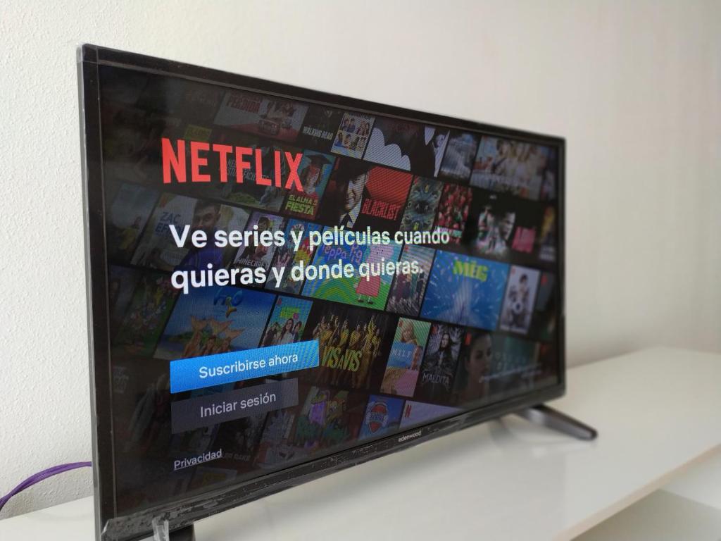 TV a/nebo společenská místnost v ubytování Apartamentos "EL BARCO"