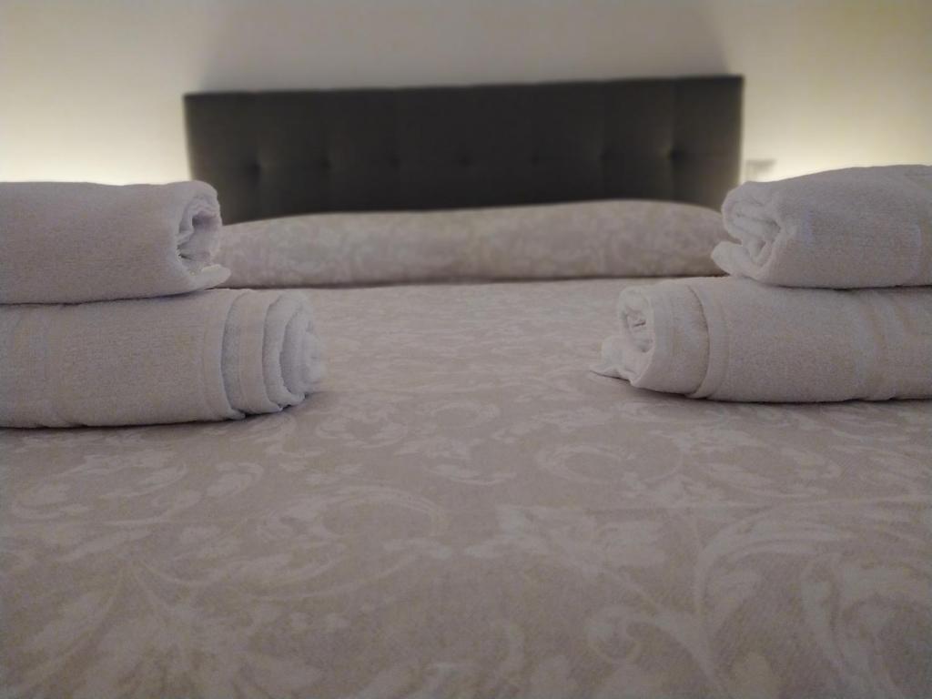 Postel nebo postele na pokoji v ubytování Apartamentos "EL BARCO"