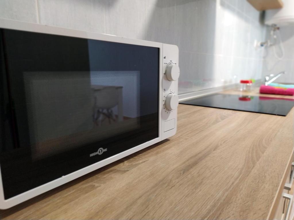 Kuchyň nebo kuchyňský kout v ubytování Apartamentos "EL BARCO"