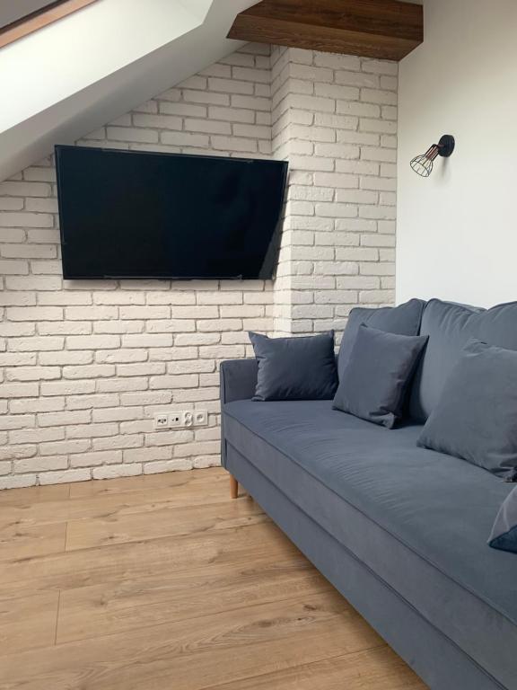 Televízia a/alebo spoločenská miestnosť v ubytovaní SEN NA MIŁEJ - APARTAMENTY przy PLAŻY - GDAŃSK BRZEŹNO
