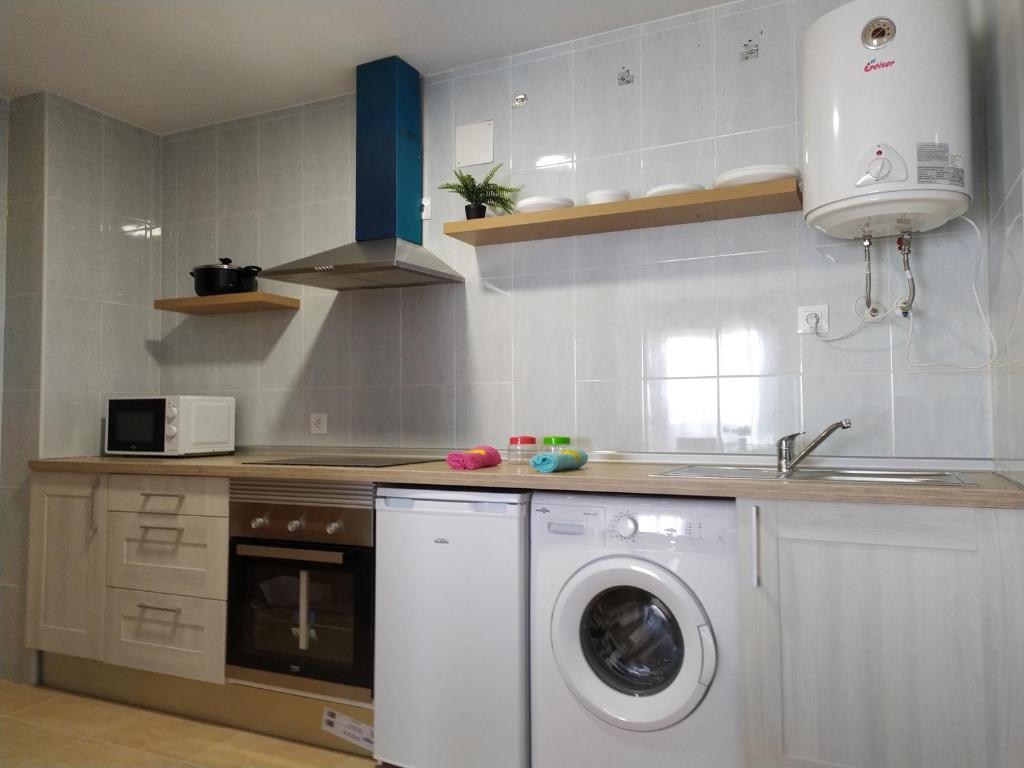 Kuchyň nebo kuchyňský kout v ubytování Apartamentos "EL BARCO"