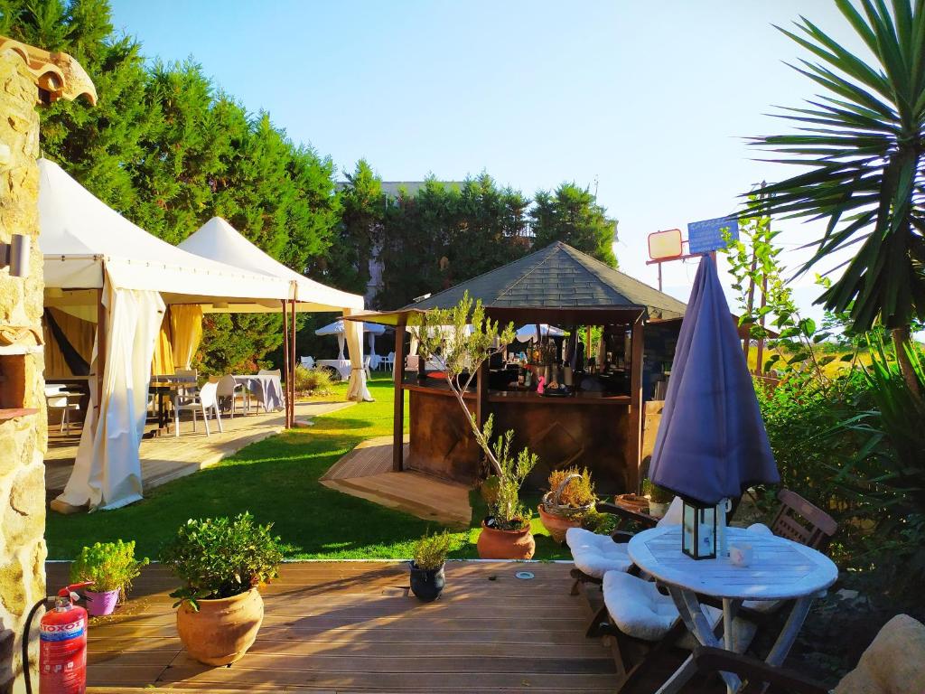 A garden outside Michaella's Maissonete at Rafaella Resort