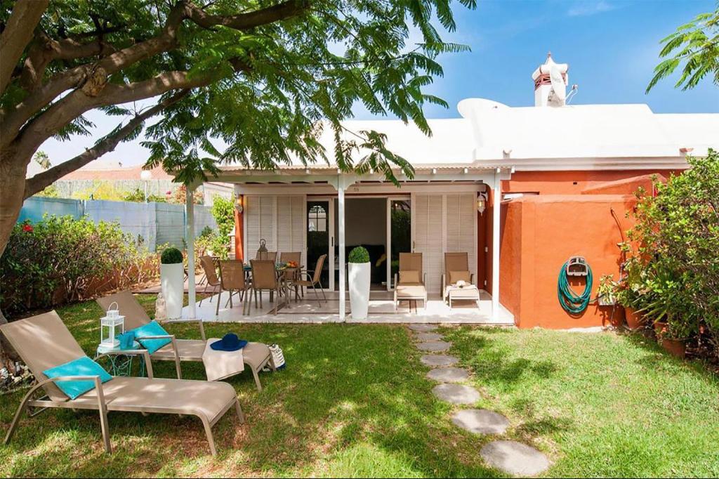 En have udenfor Flamboyant Tree Garden Holiday Home