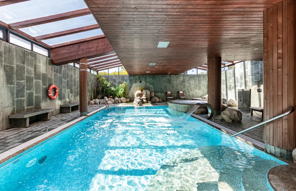 Бассейн в Hotel Spa Galatea или поблизости