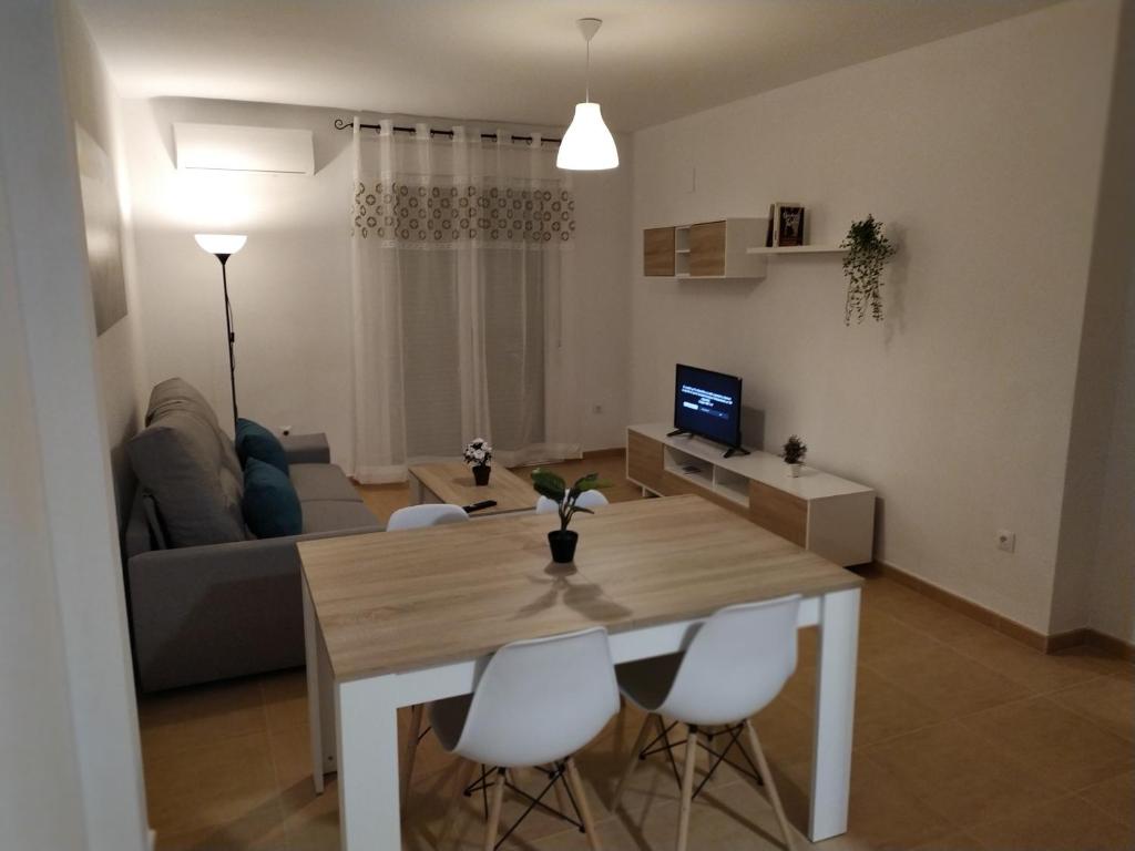 TV a/nebo společenská místnost v ubytování Apartamentos "EL BARCO"