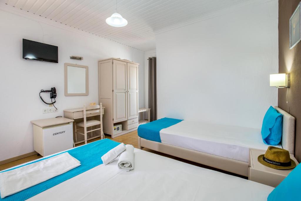 Postel nebo postele na pokoji v ubytování Green Velvet Thassos