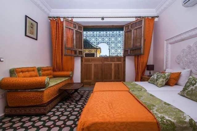 Postel nebo postele na pokoji v ubytování Riad Vega