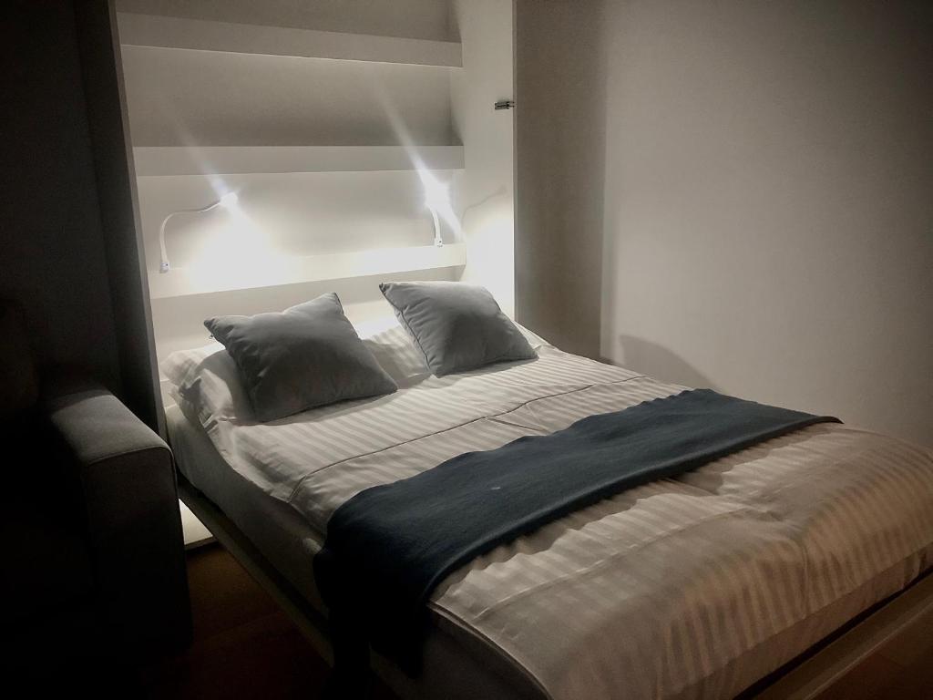 Apartamenty w Marina Royale tesisinde bir odada yatak veya yataklar