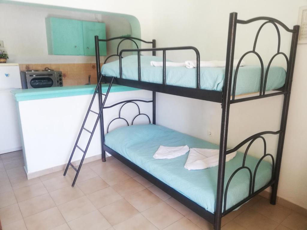 Letto o letti in una camera di Salvanos Residence