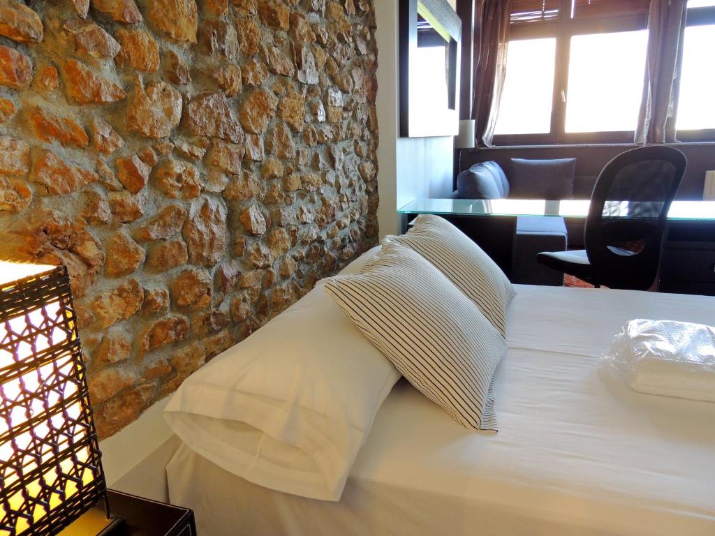 Postel nebo postele na pokoji v ubytování Casa Nacho by Delabra Apartments