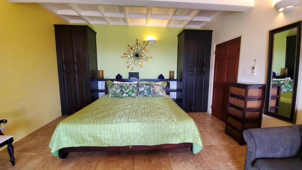 Postel nebo postele na pokoji v ubytování Villa Touloulou