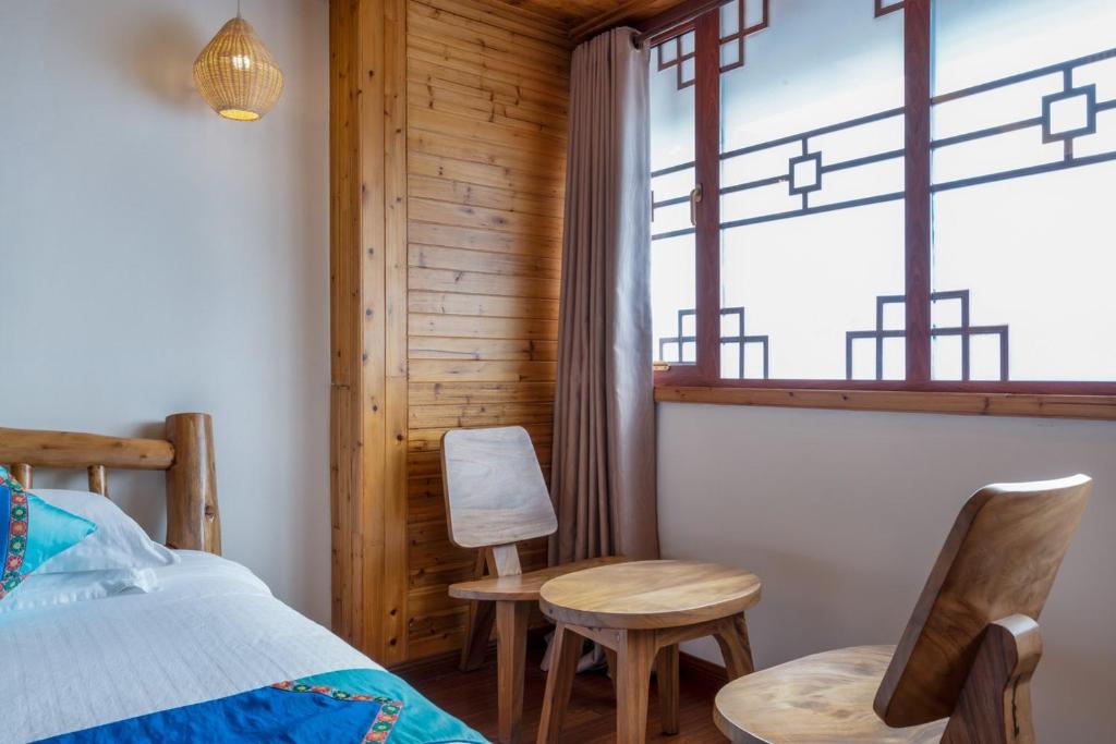 Postel nebo postele na pokoji v ubytování Ridge Inn