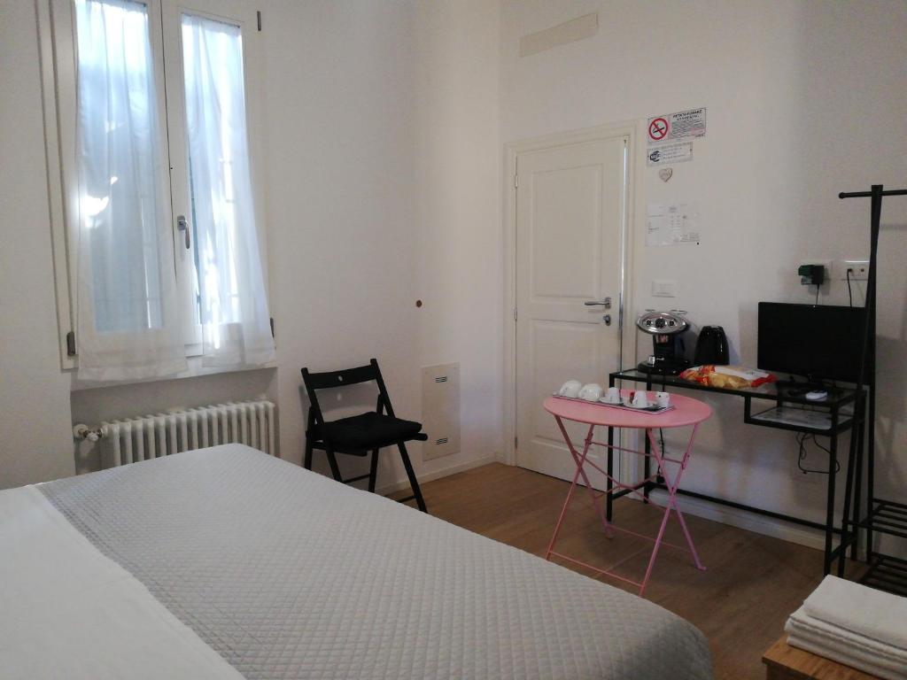 Postel nebo postele na pokoji v ubytování Stop Over BLQ