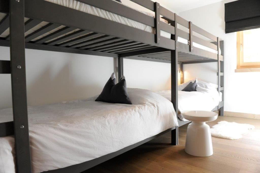 Postel nebo postele na pokoji v ubytování Luxury Grimentz Apartment
