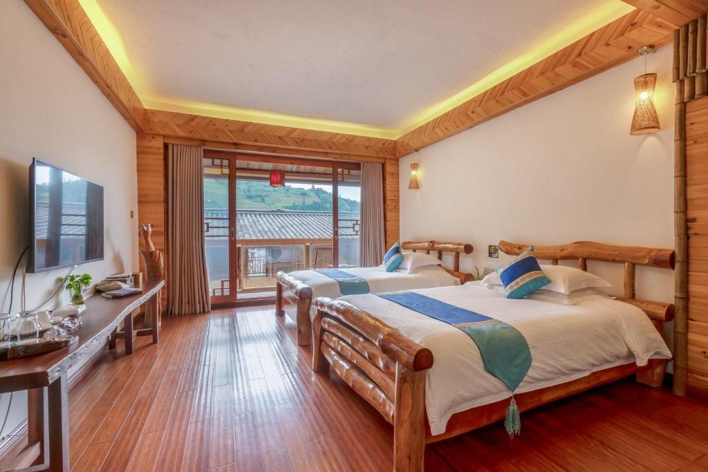 Postel nebo postele na pokoji v ubytování Ridge Inn