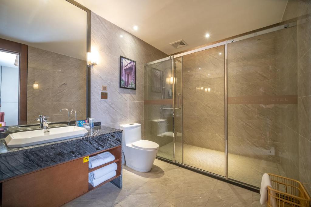 Koupelna v ubytování Relteem Hotel