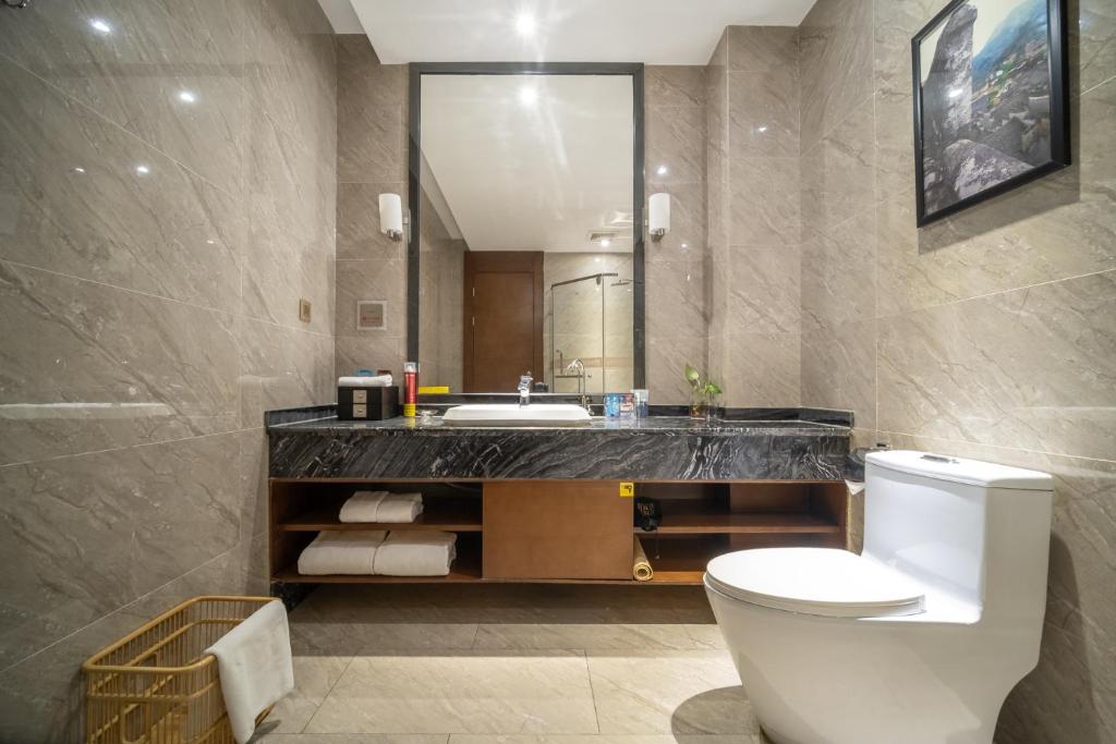 Koupelna v ubytování Relteem Hotel