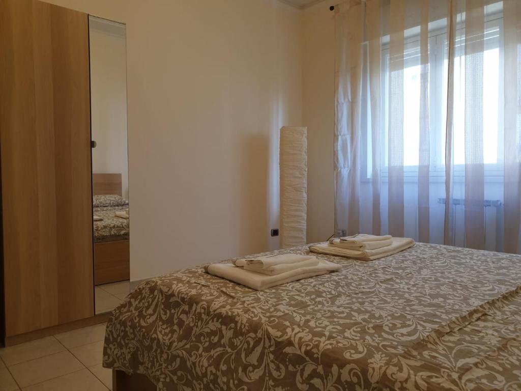 Łóżko lub łóżka w pokoju w obiekcie COCO Apartments